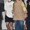BTS pakai kaus oblong dan sandal