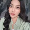 Sarwendah pakai kemeja hijau muda