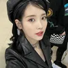 Idol K-Pop yang Tampak Elegan Saat Mengenakan Pakaian Berwarna Hitam