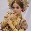 Potret Putri DA dalam busana tradisional bugis.