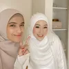 Nadya Mustika di Akad Nikah Larissa Chou