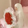 Nadya Mustika di Akad Nikah Larissa Chou