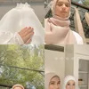 Nadya Mustika di Akad Nikah Larissa Chou