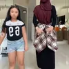 Angel Lelga dan anak semata wayangnya