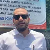 Ahmad Assegaf pakai kacamata