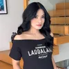 Titi Kamal Pakai Kaus PERUMAHAN LADDALAND