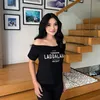 Titi Kamal di Tangga