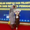 Claudia Andhara Tampil Anggun di Pelantikan Notaris