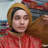 Dhini Aminarti