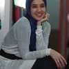 Dhini Aminarti
