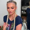 Agnez Mo Pakai Daster