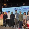 Whisnu Santika berdiri di tengah