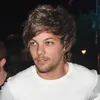 Louis Tomlinson Injak Wajah Naughty Boy di Panggung