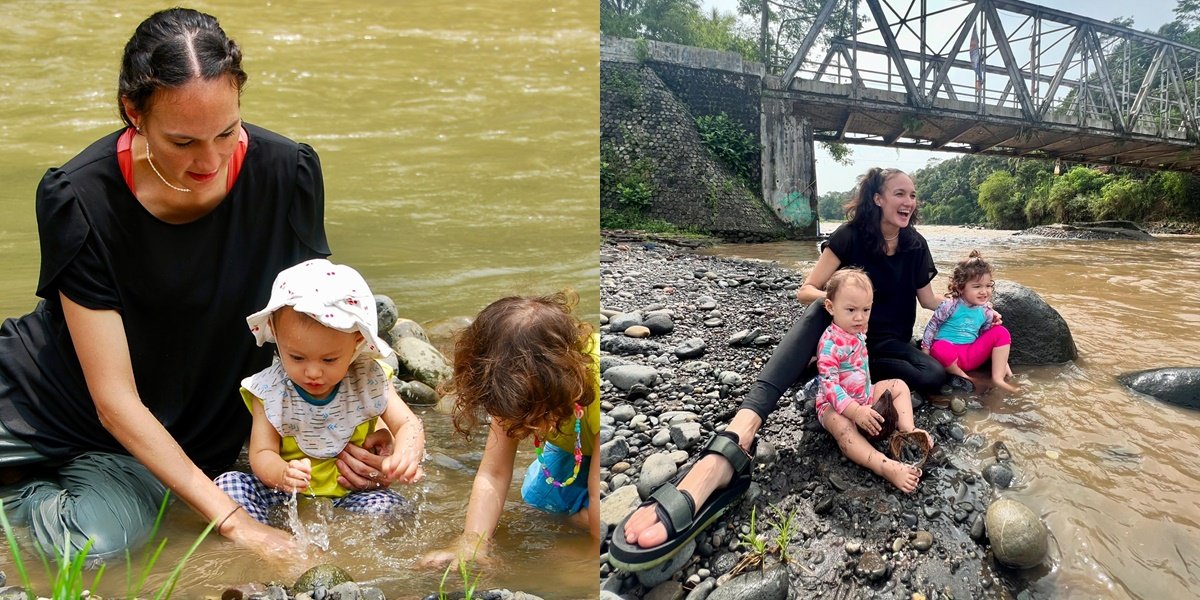 7 Potret 2 Anak Nadine Chandrawinata Diajak Main ke Sungai, Main Bareng Sambil Berendam