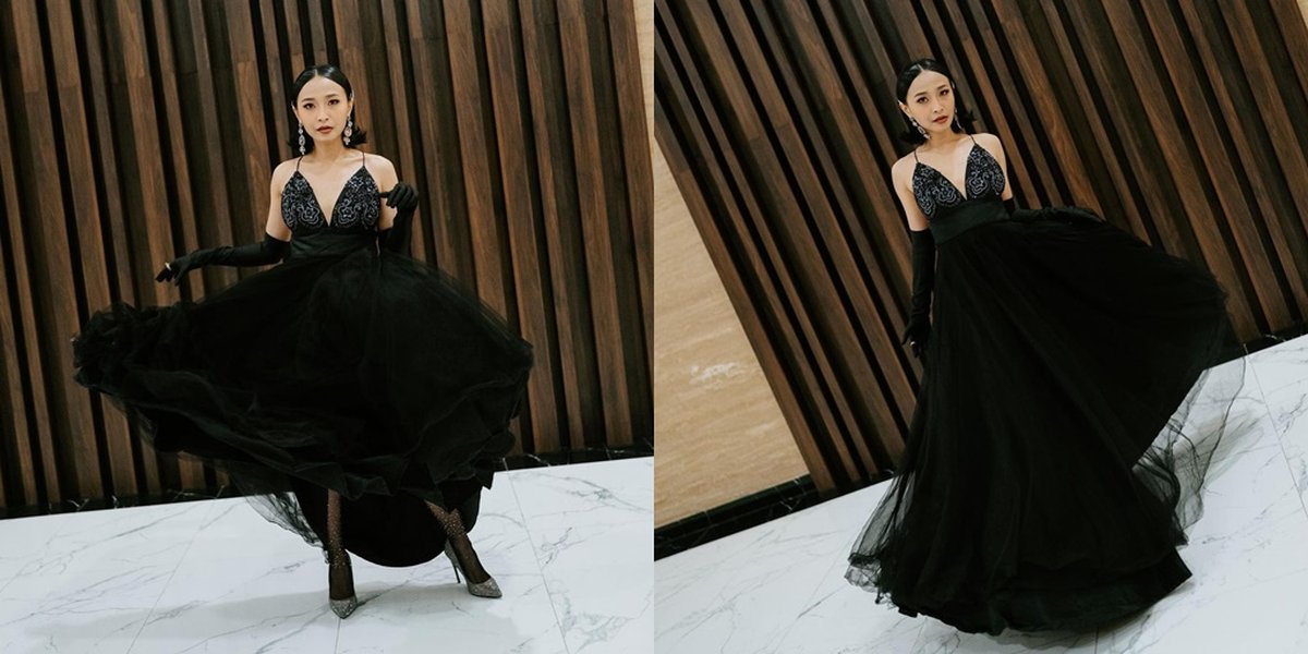 10 Portraits of Rinni Wulandari Wearing a Black Backless Dress with a High Slit, Looking Beautiful with Her Short Hair - Showing off Her Smooth Back