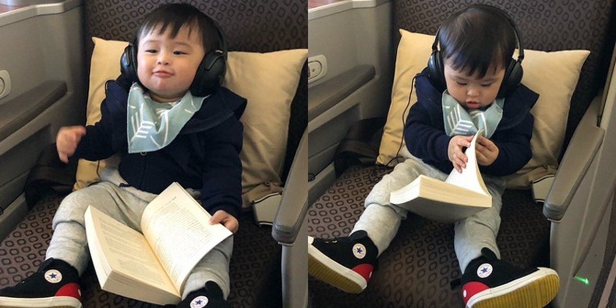 7 Photos of Raphael Moeis Sitting Sweet Like a Little Boss on the Plane