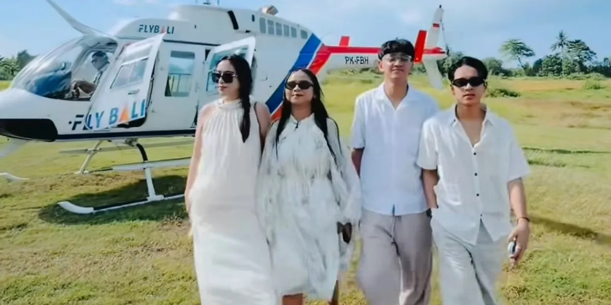 7 Photos of April DA7 Riding a Helicopter to Bali with Her Boyfriend, Arbil DA7 as Mosquito Repellent