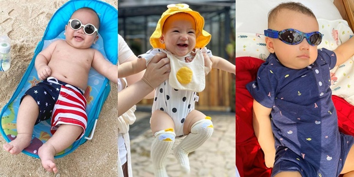 7 Adorable Vacation Styles of Celebrity Children, Wearing Sunglasses - Egg Dress