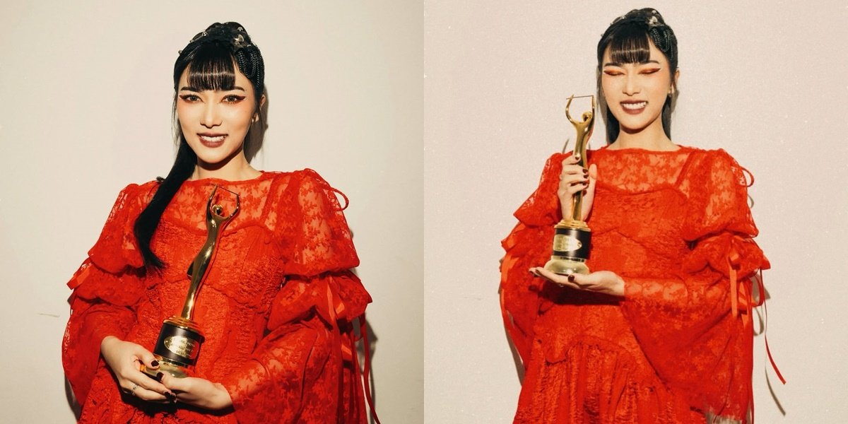 7 Photos of Isyana Sarasvati Winning the AMI Awards 2024, Bringing Home the Best Solo Rock Artist Trophy