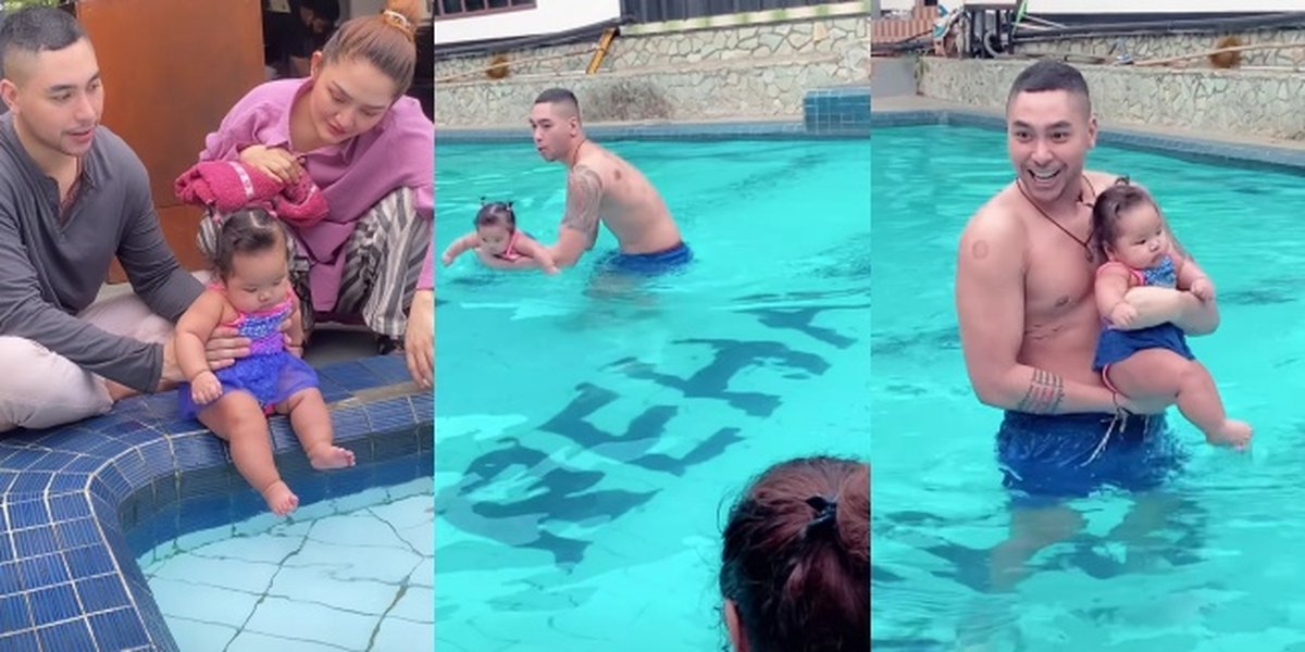8 Portraits of Krisjiana Teaching Baby Xarena Dolphin-Style Swimming, Successfully Making Siti Badriah Panic Even Though Their Baby Remains Calm