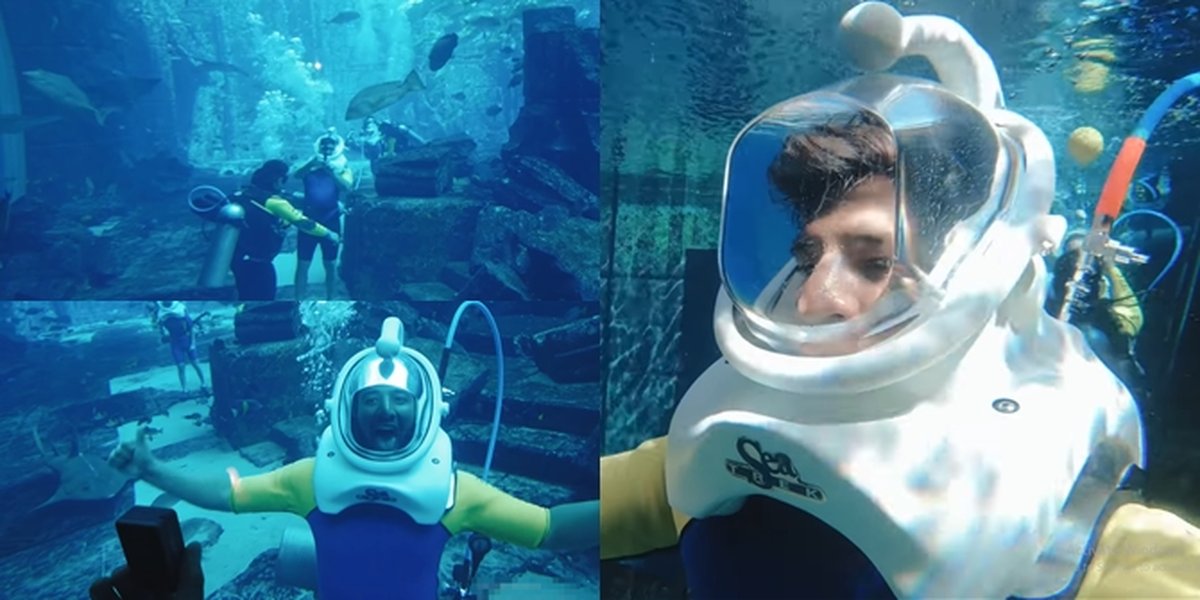 9 Photos of Ammar Zoni Sightseeing in Dubai, Trying to Dive into the Largest Aquarium