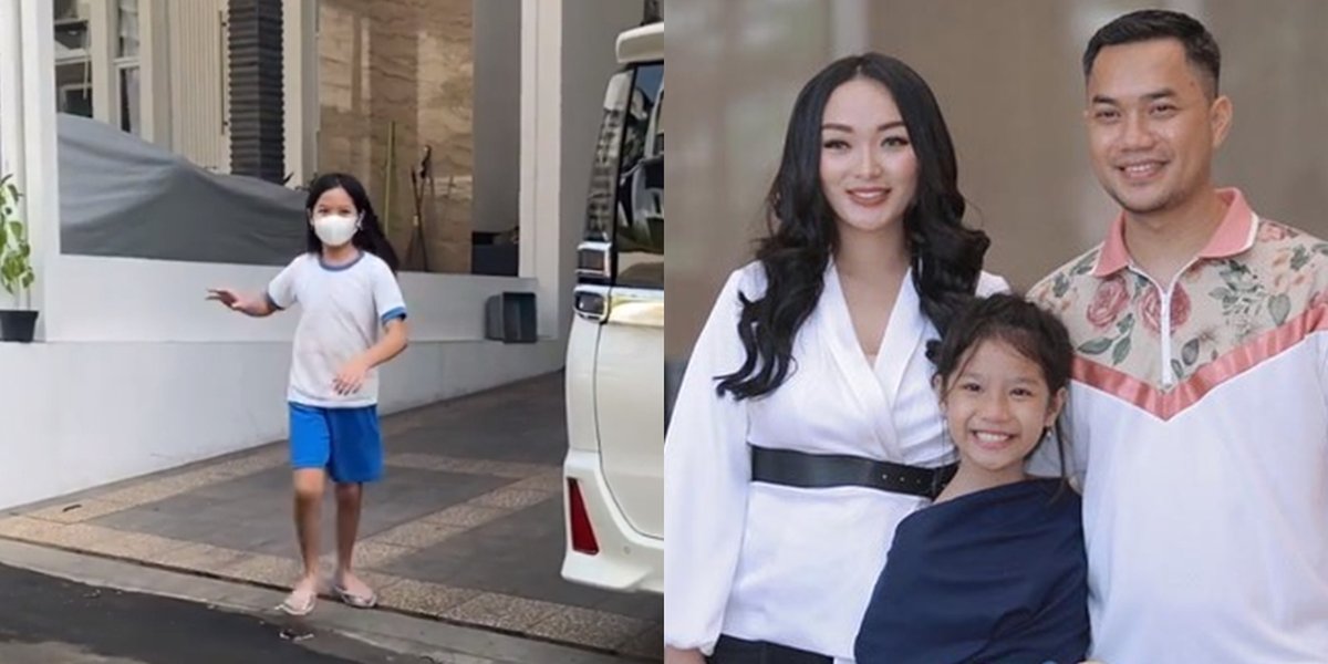 9 Portraits of Aqila, Zaskia Gotik's Stepchild, Celebrating Her Birthday on the Side of the Road, Simple Happiness - Netizens Focus on the Child's Face Covered by the Cake