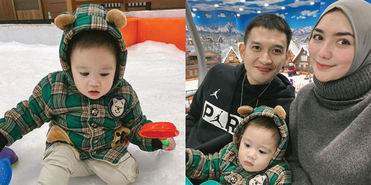 Adorable! Series of Photos of Baby Athar, Child of Citra Kirana and Rezky Aditya, Playing in the Snow for the First Time: Warm Family Togetherness