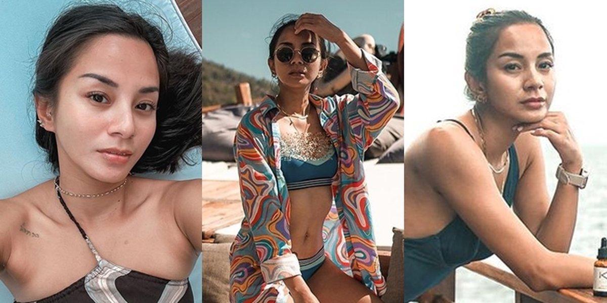A Series of Photos of Kirana Larasati's Hot Bikini Style on the Beach, Showing Body Goals and Rose Tattoo on the Hips