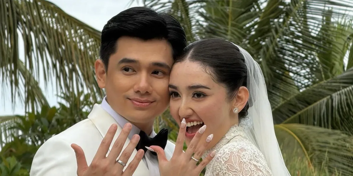 Detail of Ranty Maria's Wedding Dress During the Blessing, Concept of Quiet Elegance