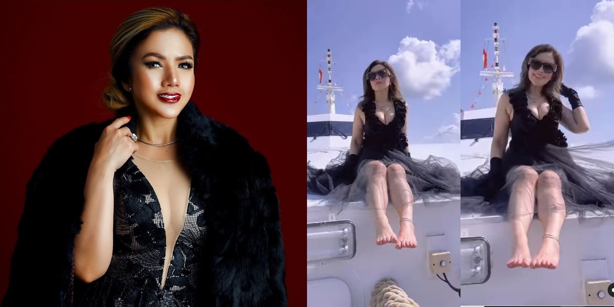 Sitting on a Ship, Portrait of Barbie Kumalasari Looking Sexy Wearing a High-Slit Black Dress - Looks Even More Beautiful with Black Sunglasses