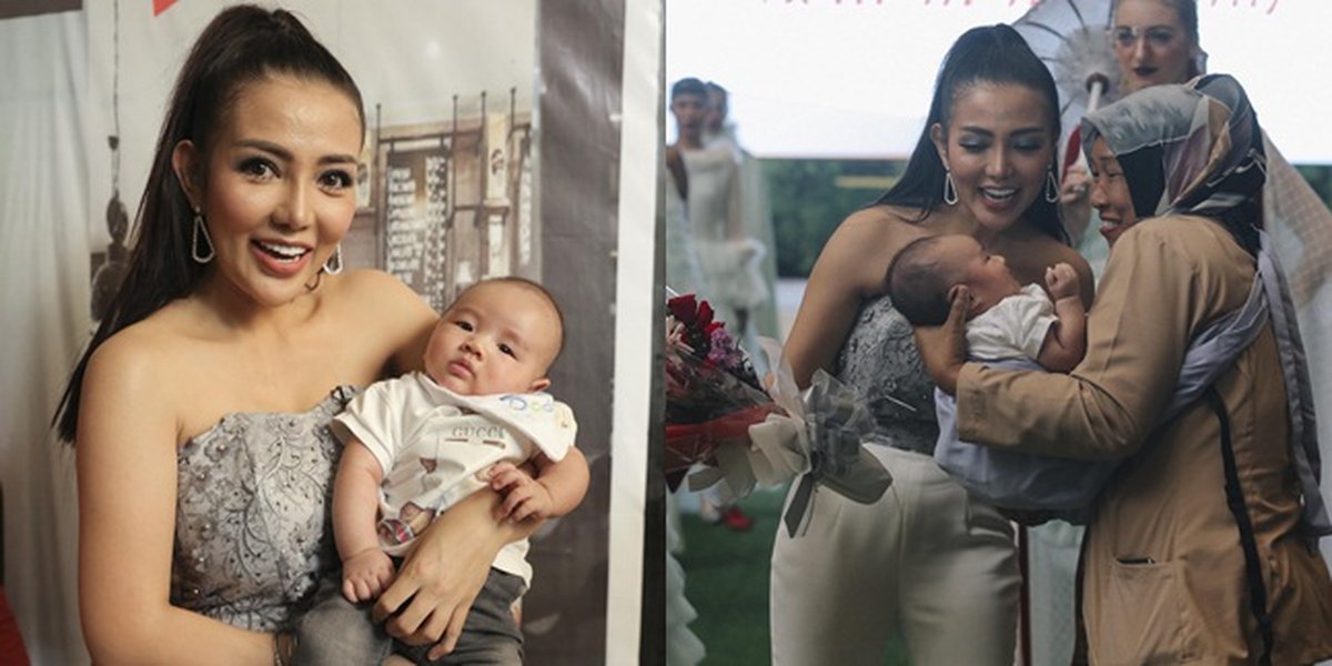 Exclusive! Holding a Fashion Show, Bella Shofie Brings Her Little One