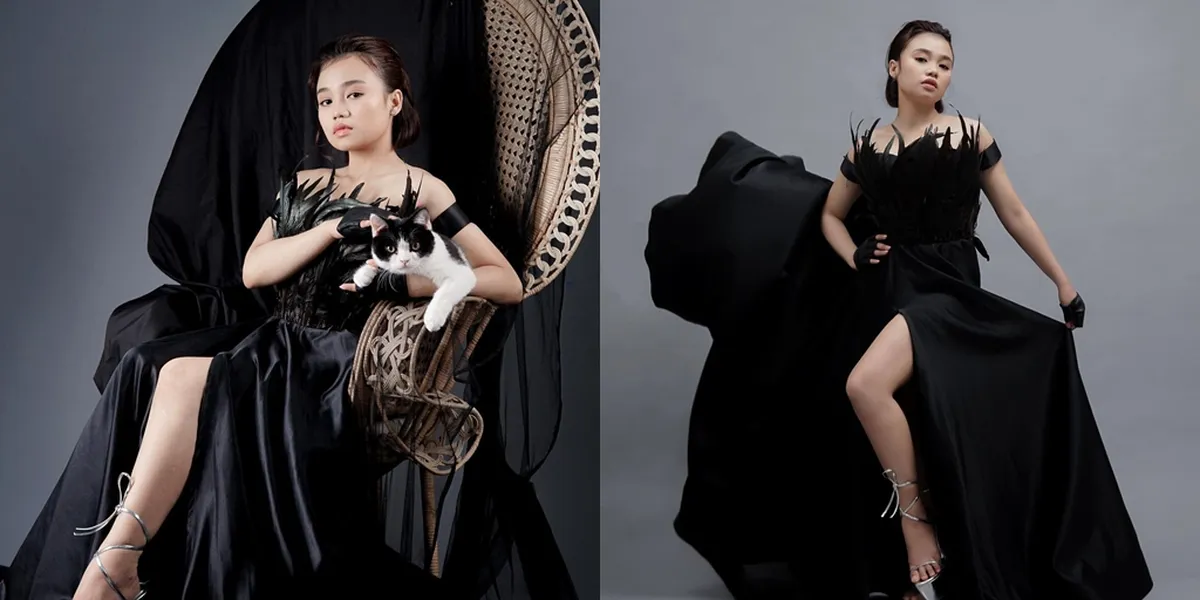 Photo with Cats, Peek at Aulia DA's Unique Photoshoot - Elegant in a High-Slit Black Dress