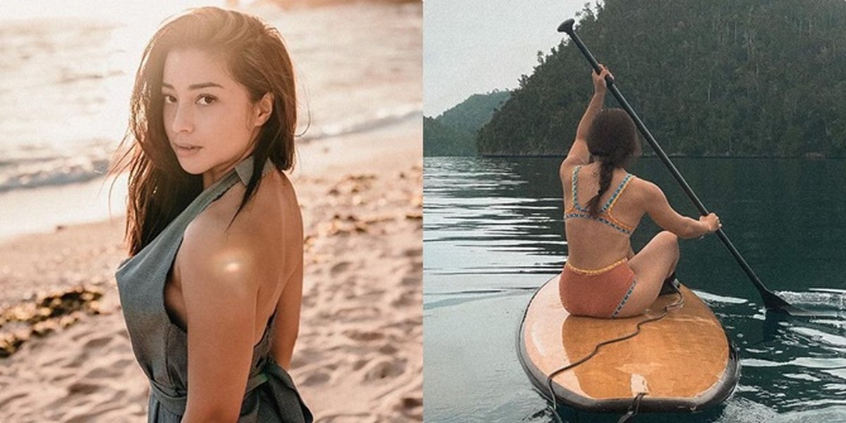 Nikita Willy Shows Off Her Stunning Body in a Series of Bikini Photos During Vacation, Relaxing at the Beach and Swimming with Sharks!