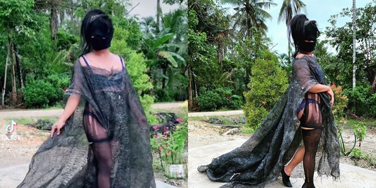 Portrait of Mimi Peri Dressed Like Kim Kardashian at Met Gala 2021, Her Dress is Made of Underwear Covered in Fishnet