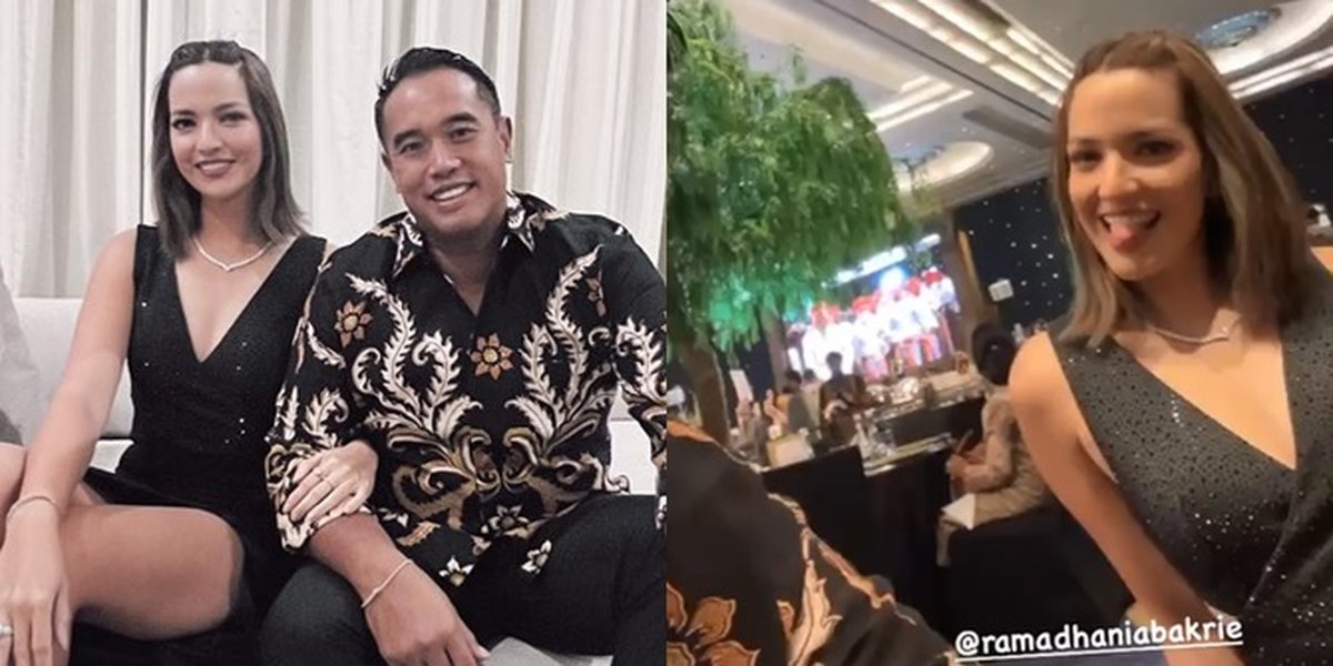 Photo of Nia Ramadhani and Ardi Bakrie at a Wedding, Her Dress Has a High Slit and Looks Funny When She Pokes Her Husband