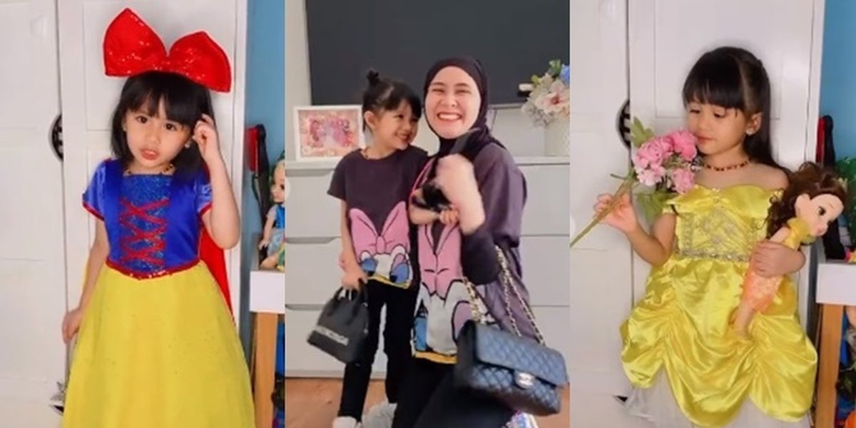 Photo of Qiandra, Ryana Dea's Child, and Puadin Redi Wearing Disney Princess Dress, a Beautiful and Adorable Little Princess