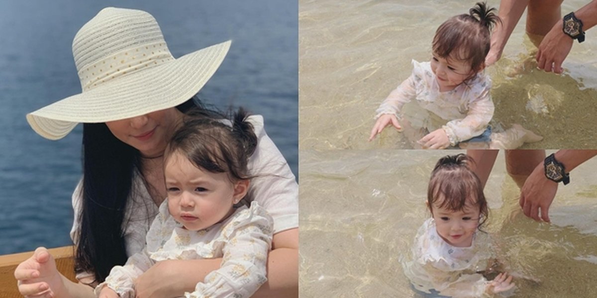 Her Style is Getting Cuter, 8 Photos of Asmirandah Inviting Baby Chloe to the Beach - Fearless White Baby