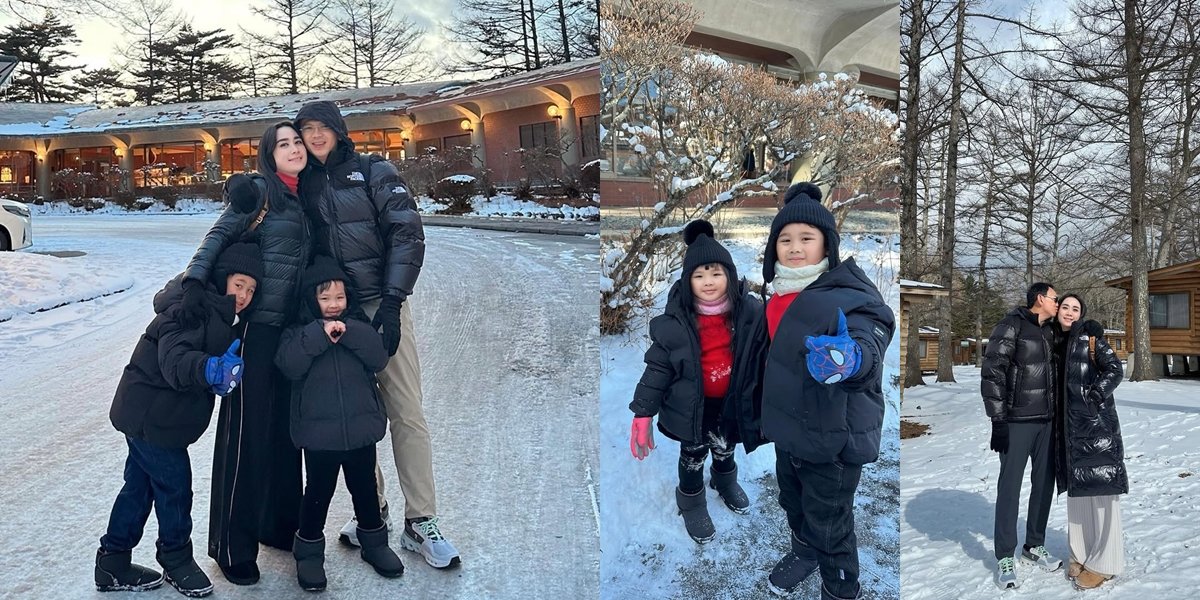 Portrait of Ahok and Puput Enjoying a Romantic Snowy Vacation - Happy Children