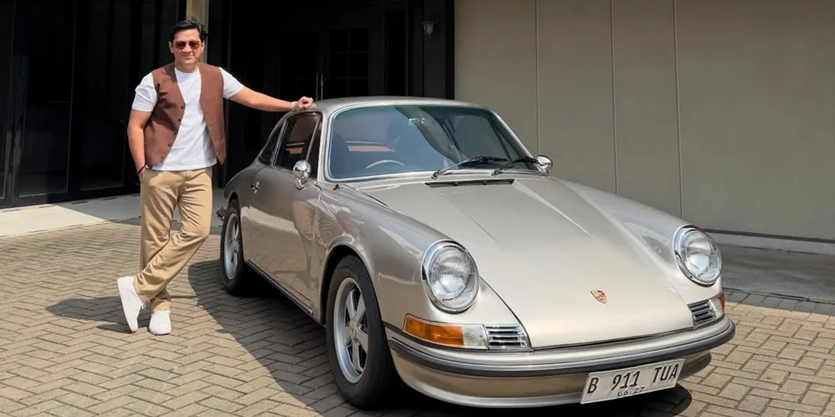 Portrait of Andre Taulany Posing with Classic Porsche Car, Old but Handsome
