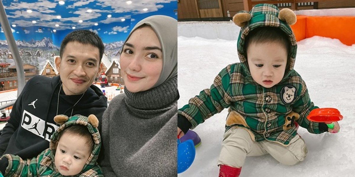 Portrait of Baby Athar, Citra Kirana's First Snow Play, So Cute He's Called a Korean Baby