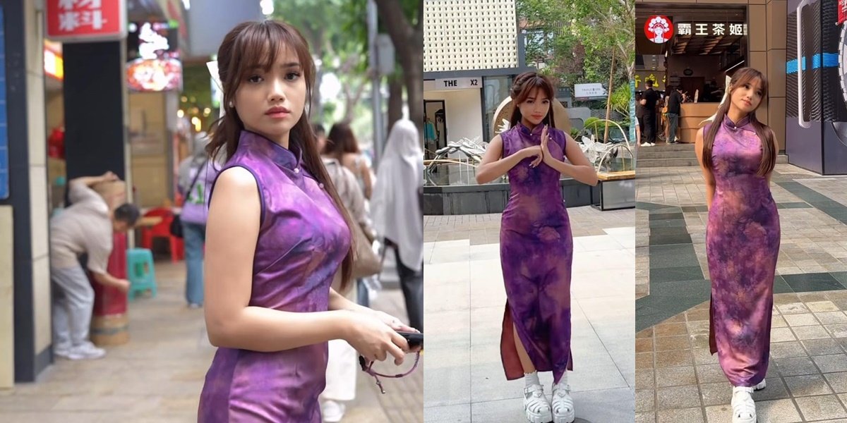 7 Beautiful Photos of Fuji in a Purple Cheongsam, Her Poses are Cute and Addictive