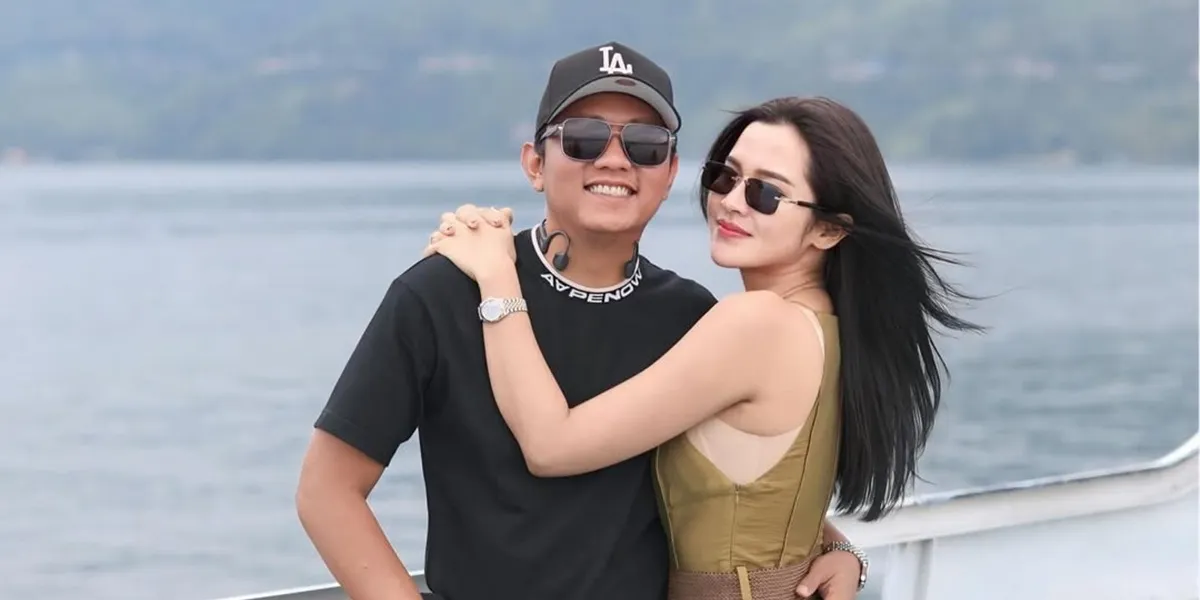 Portrait of Denny Caknan and Bella Bonita Vacationing at Lake Toba, Riding Jetski Together
