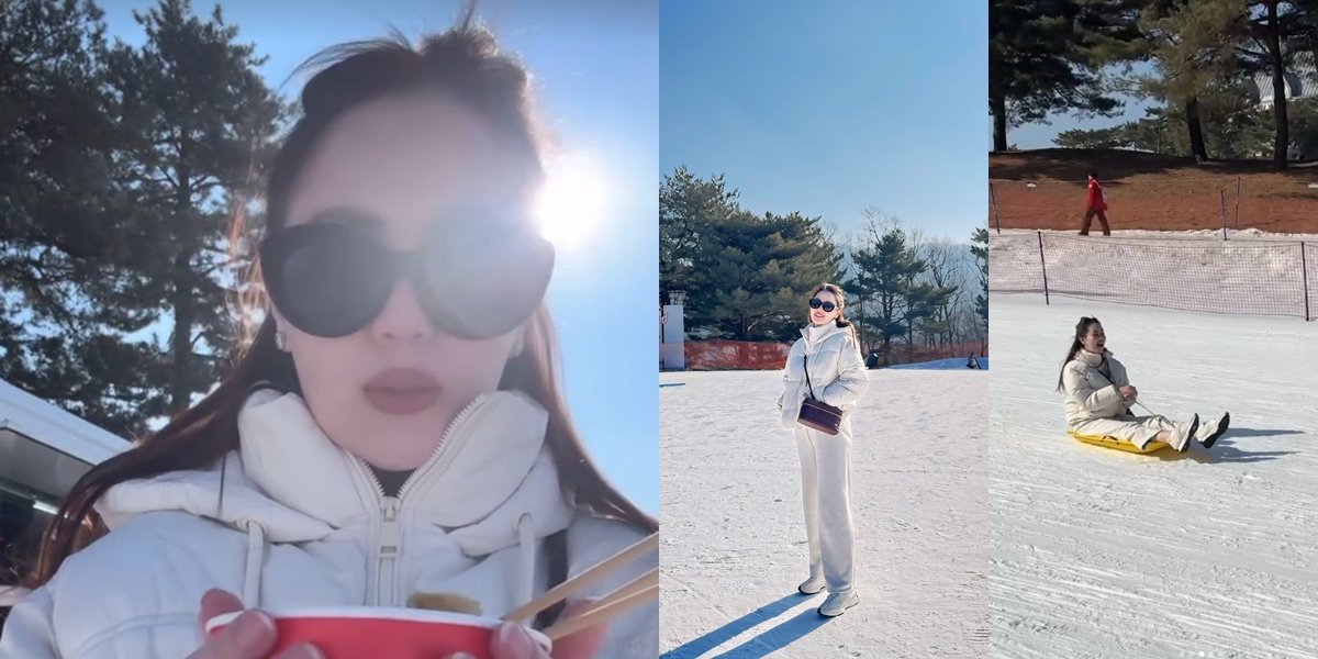 Portrait of Jeje Dunn Continuing Her Vacation Enjoying Snow in Korea, Dressed All in White - Fun Sliding