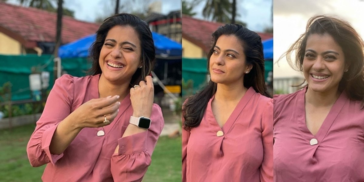 Portrait of Kajol Striking a Fun Pose in Front of Tarp, Still Stunning Despite the Unimpressive Background