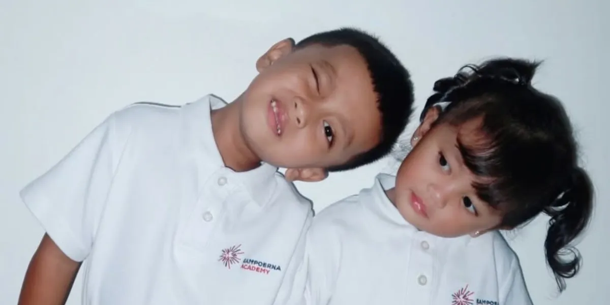 Portrait of Hanum Mega's Two Children Starting School, Looking Adorable in Uniforms