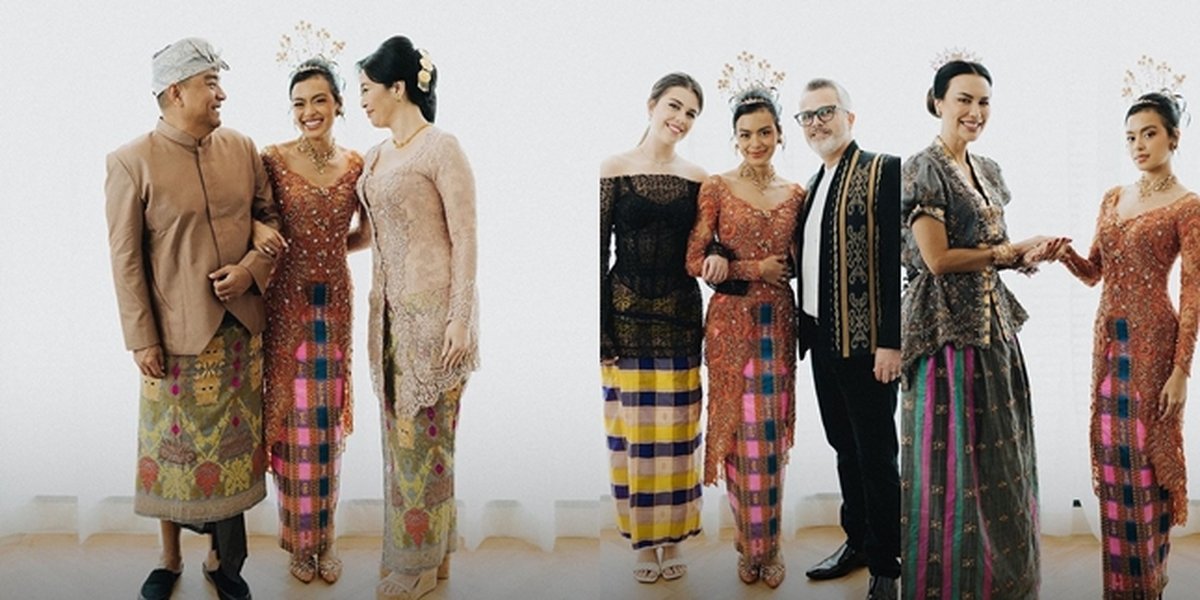 Portrait of Eva Celia's Family Wearing Traditional Clothes with the Theme of Bhinneka Tunggal Ika that Just Revealed