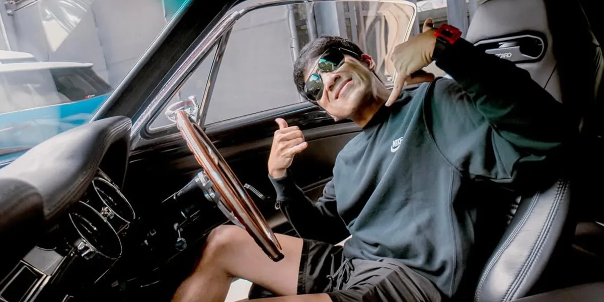 Cool Portrait of Desta Driving a Classic Car, His Style is Absolutely Badass