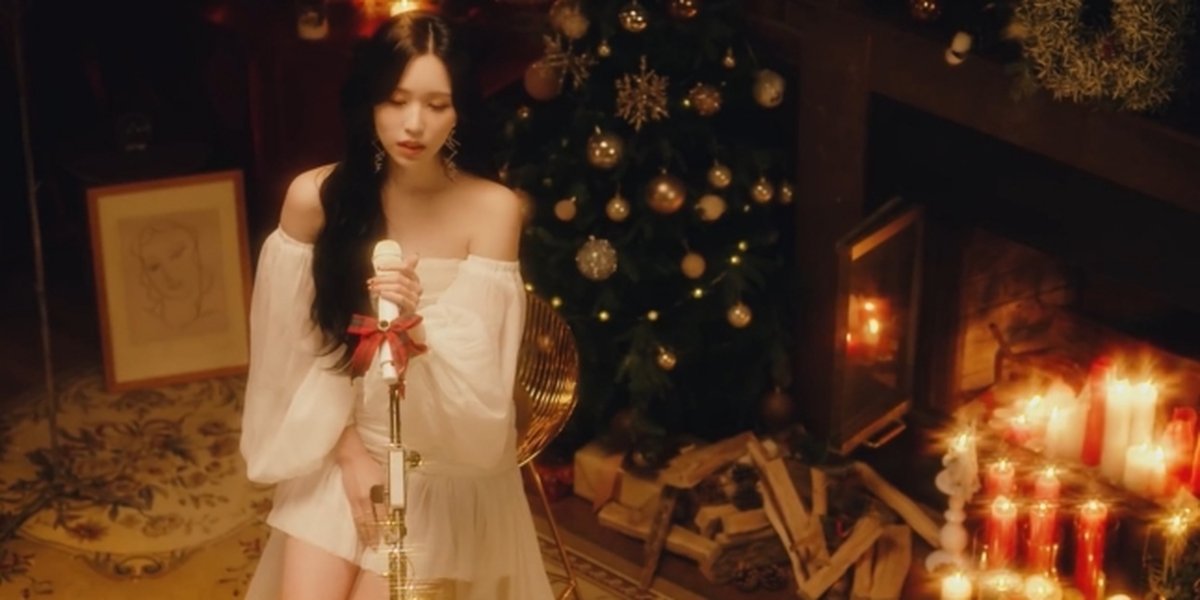 Portrait of Mina TWICE in Sia's 'Snowman' Cover Project, Showcasing a Sparkling Christmas Vibe!