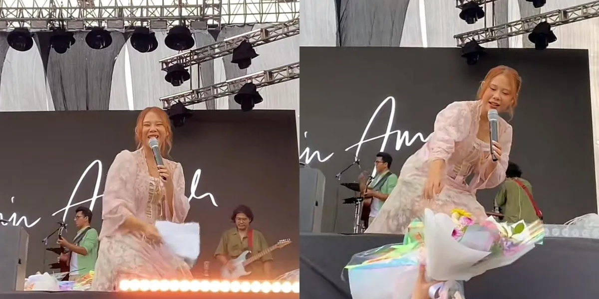 Portrait of Nadin Amizah Signing a Thesis for a Fan During a Performance