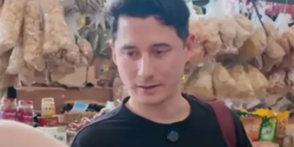 Portrait of Nino Fernandez Enjoying Shopping at the Market, Quick to Chat with Vendors